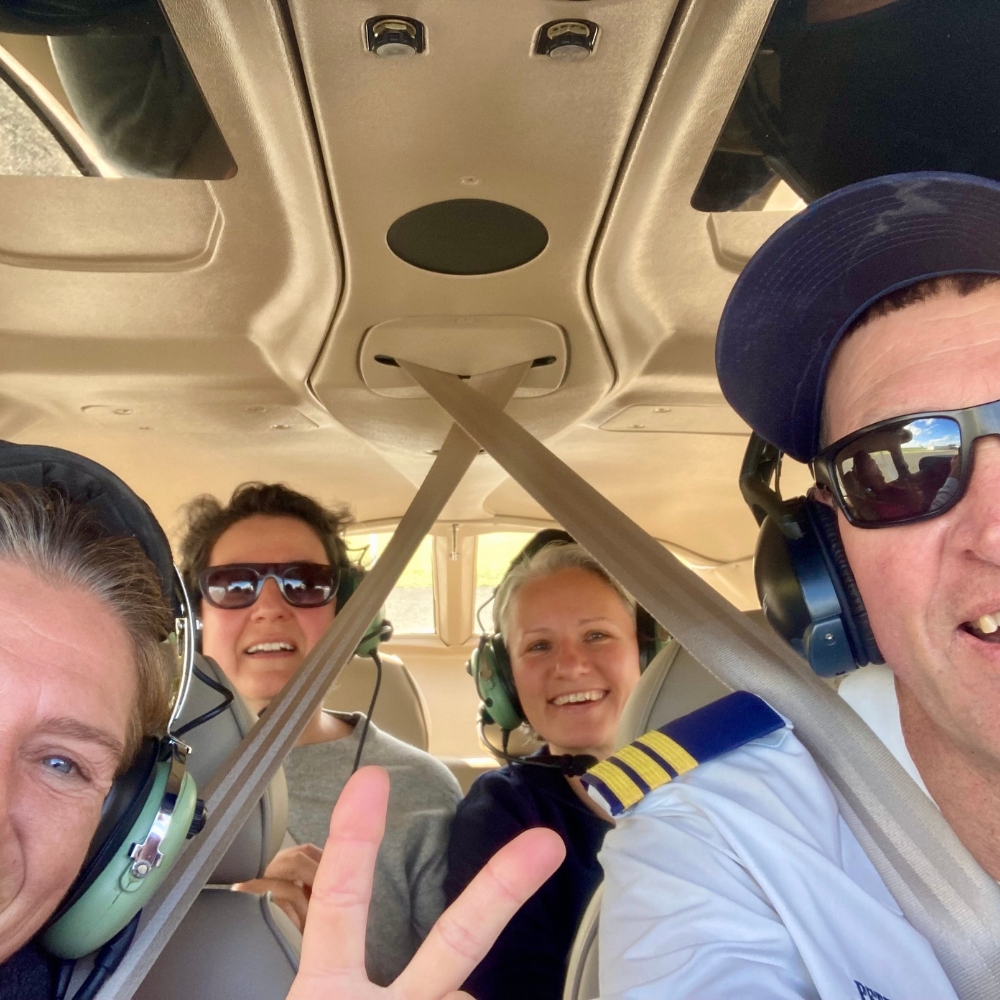 Guests and pilot inside the cabin during the flight